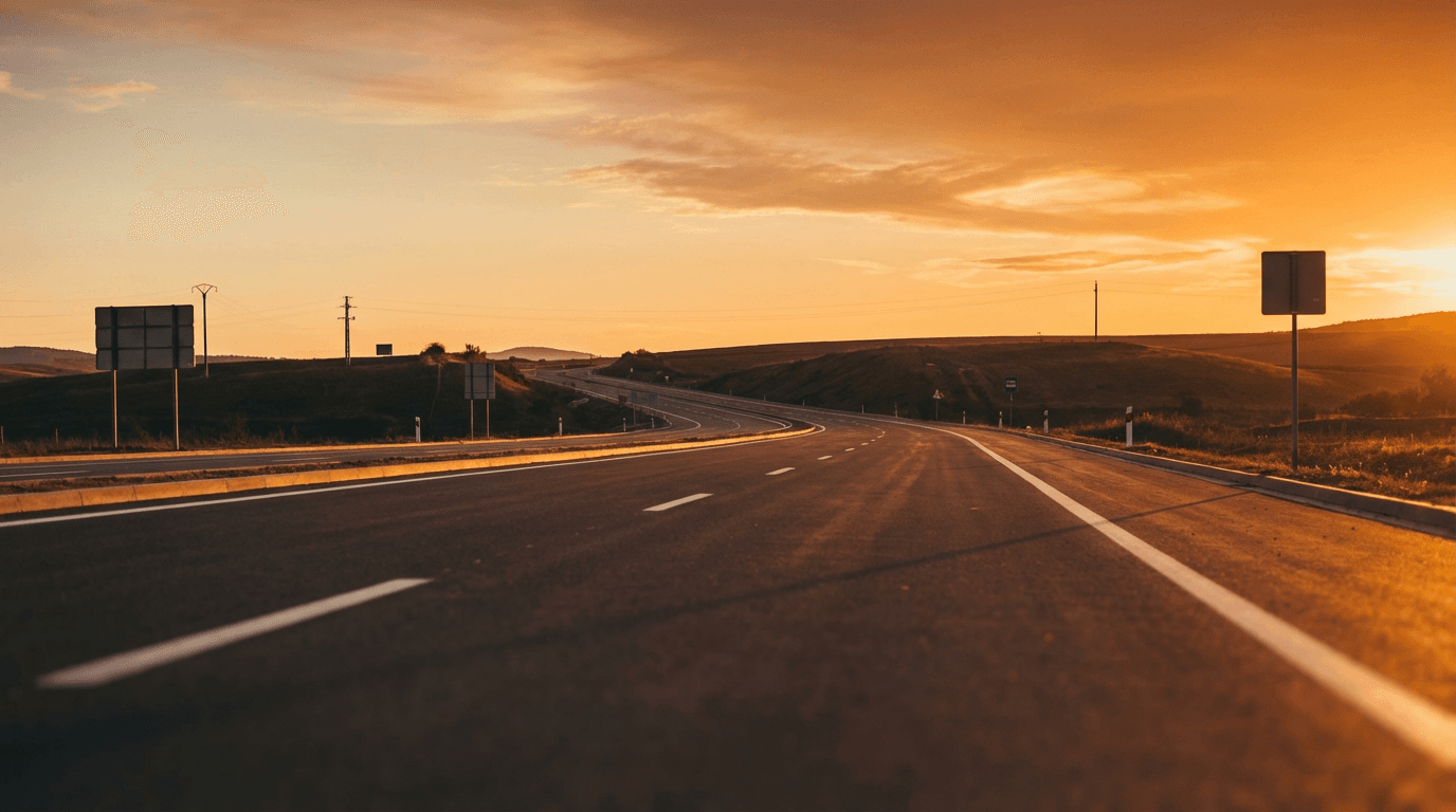 Transit Tales moving truck on highway at sunset